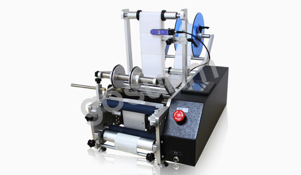 半自動圓瓶貼標(biāo)機(jī) 半自動圓瓶貼標(biāo)機(jī)